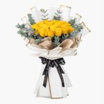 دسته گل رز زرد در بسته بندی شیک مناسب هدیه